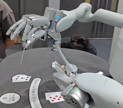 The SharpaWave robotic hand on display, demonstrating its fine manipulation capabilities.