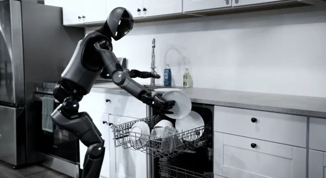 Robot alle prese con le faccende domestiche in una demo in cucina