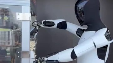 Tesla's Optimus Robot serveert lekkernijen in diner